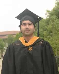 Portrait of Iram Tazim Hoque in Purdue graduation regalia